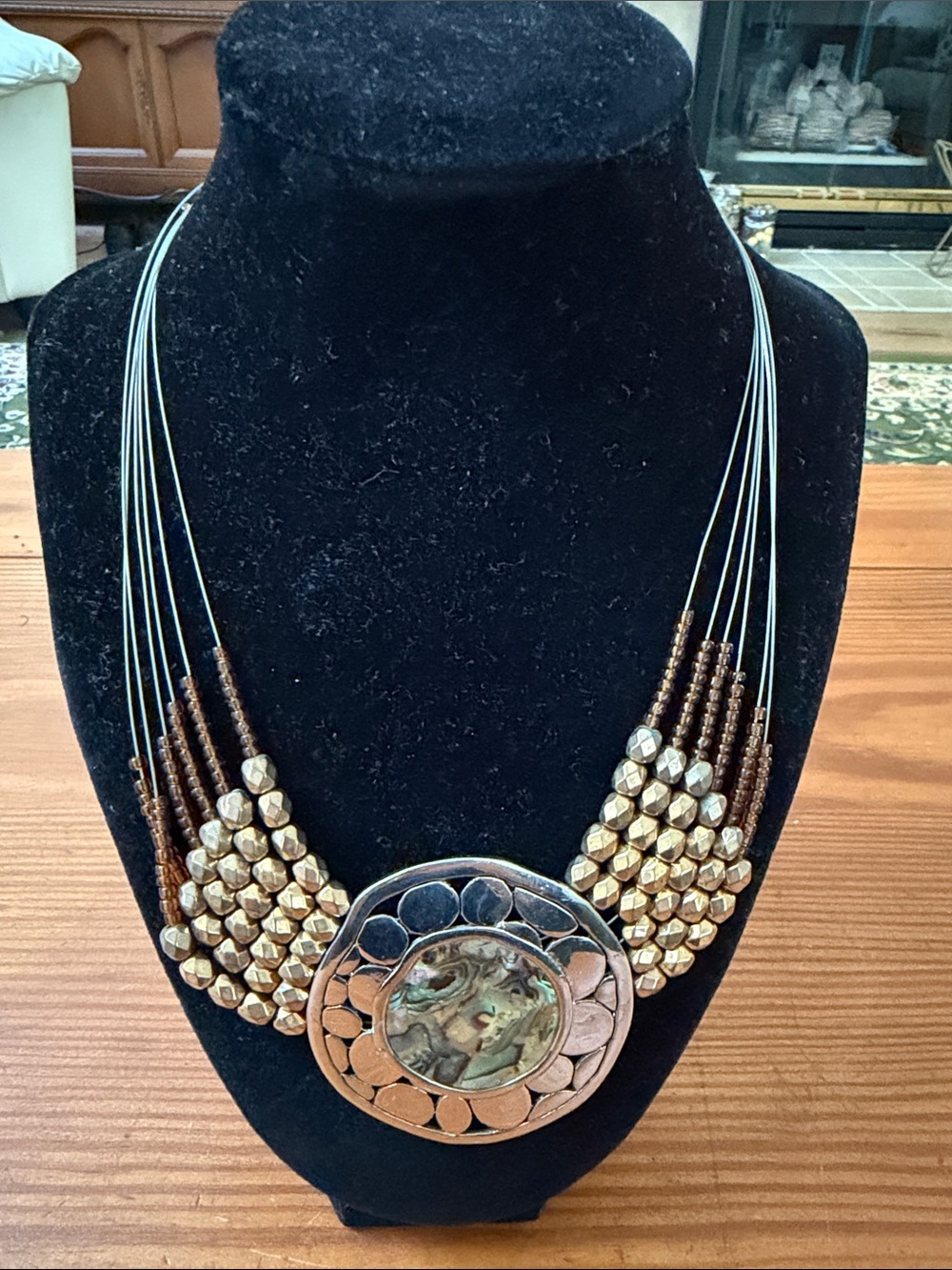 Multistrand Brown and Gold Statement Necklace with Abalone Medallion